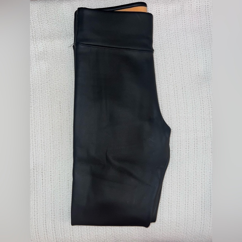 Black leather pants, women with faux fur inside